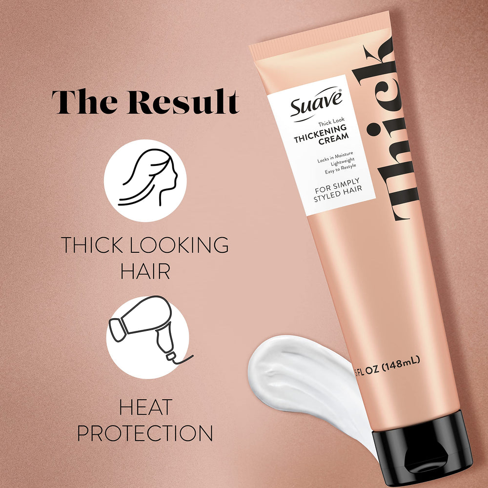 Hands applying Suave Simply Styled cream to wet hair for even distribution.