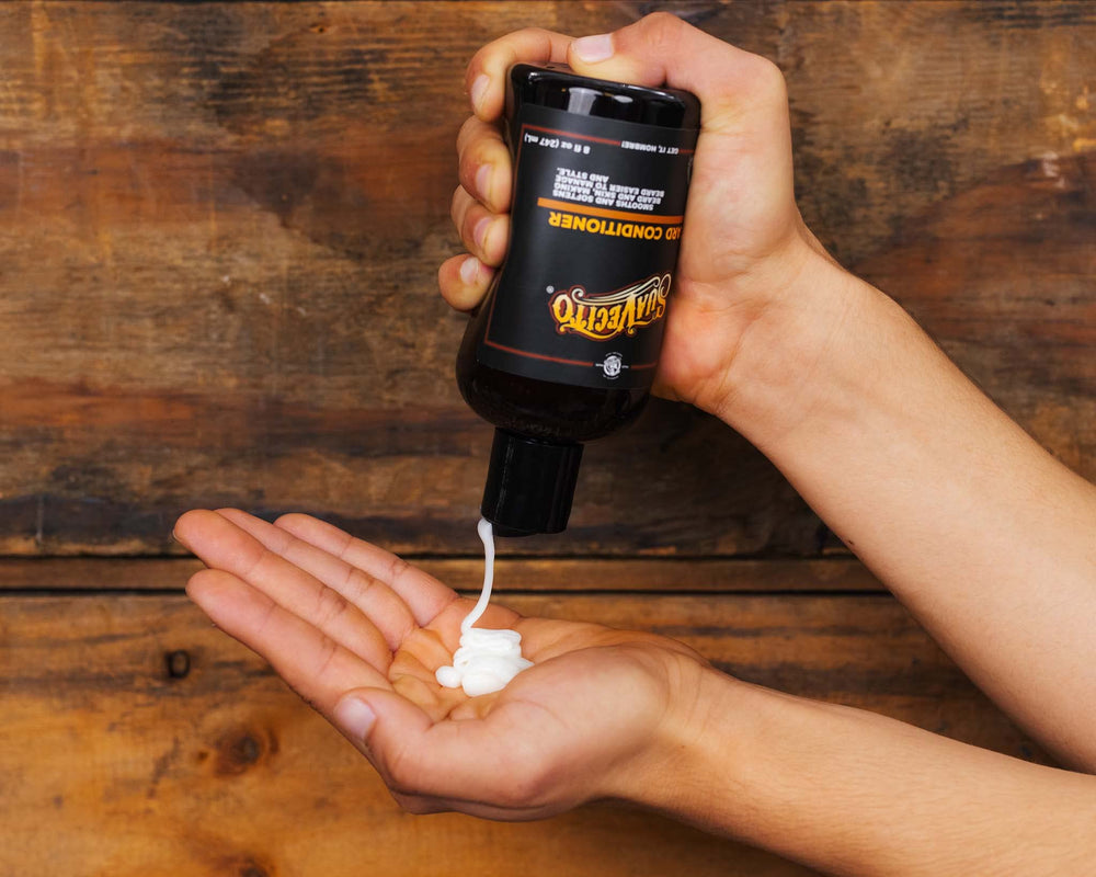 Suavecito Beard Conditioner application scene shows easy styling and control.