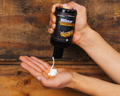 Suavecito Beard Conditioner application scene shows easy styling and control.