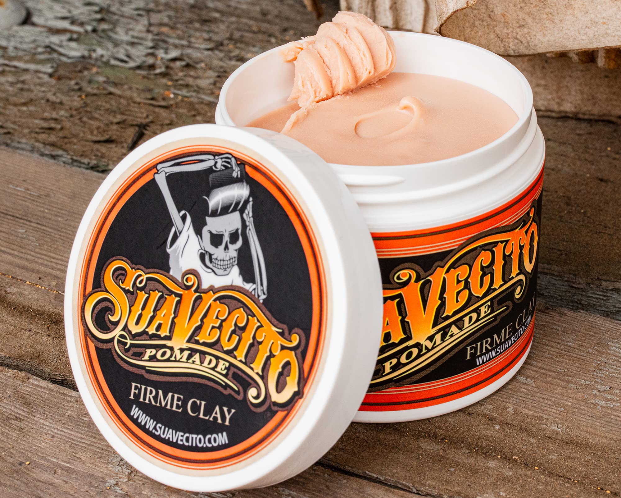 Suavecito Firme Clay applying for easy hair sculpting.