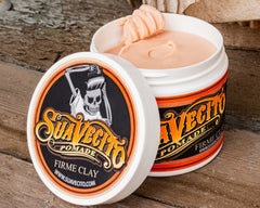 Suavecito Firme Clay applying for easy hair sculpting.
