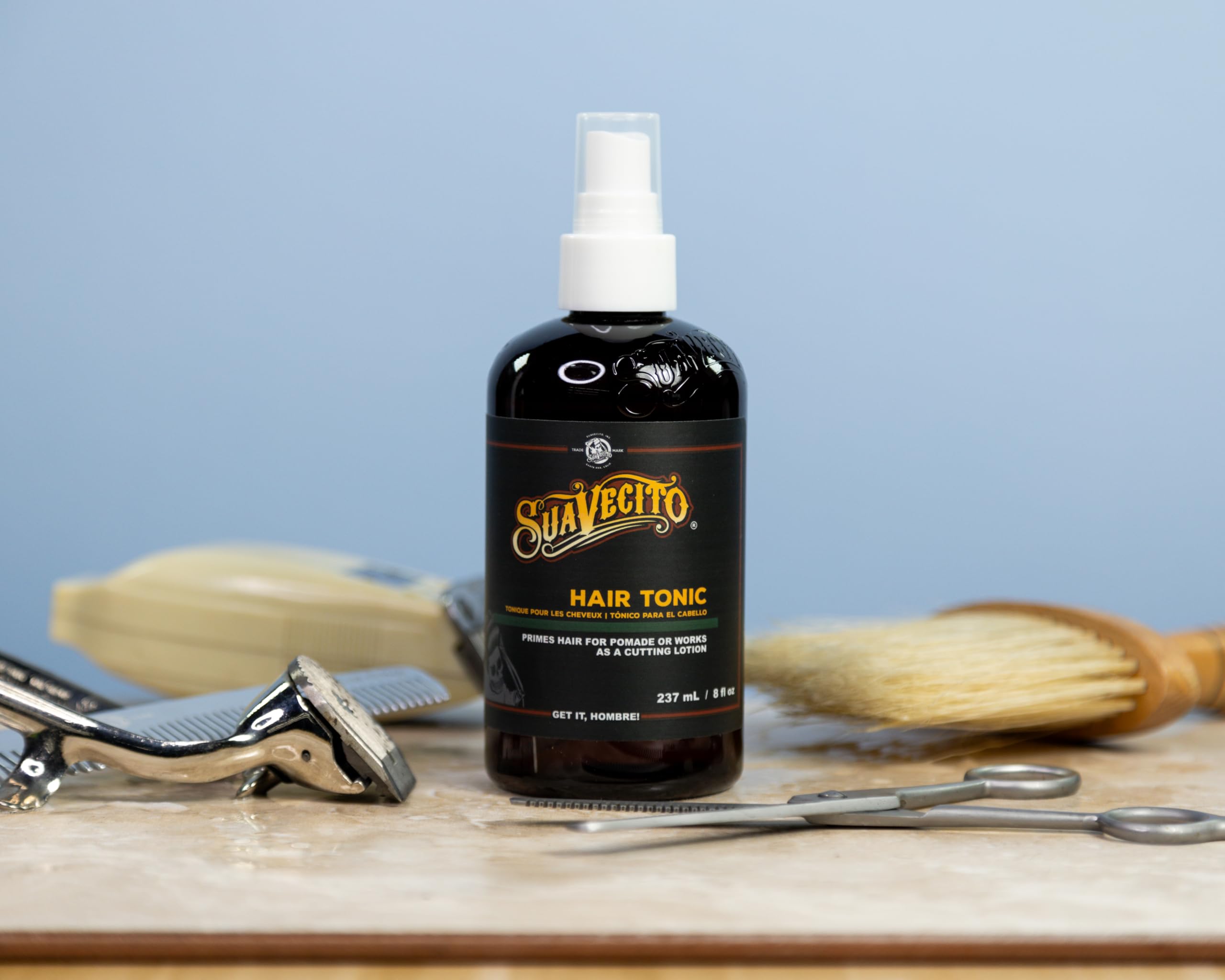 Suavecito Hair Tonic with rosemary leaves promoting scalp nourishment