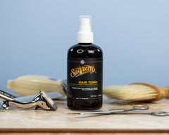 Suavecito Hair Tonic with rosemary leaves promoting scalp nourishment