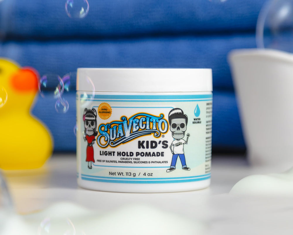 Suavecito Kids Pomade Calming Chamomile Label Closeup shows chamomile scent and kid-safe ingredients.