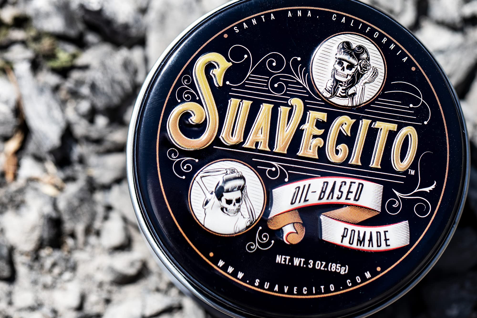 Suavecito Oil Based Pomade hands warm application demonstrates pliable hold for shaping.