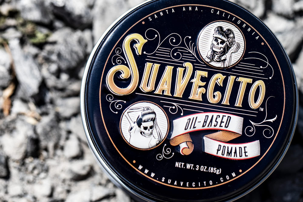 Suavecito Oil Based Pomade hands warm application demonstrates pliable hold for shaping.