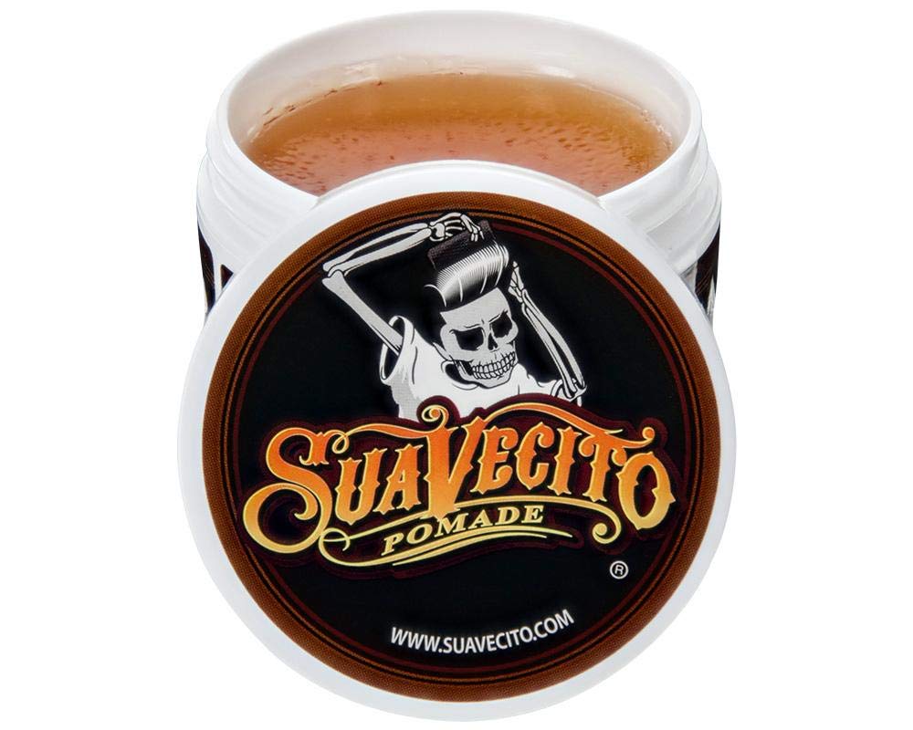 Suavecito Pomade Original Hold application shot emphasizes creamy texture for smooth combing