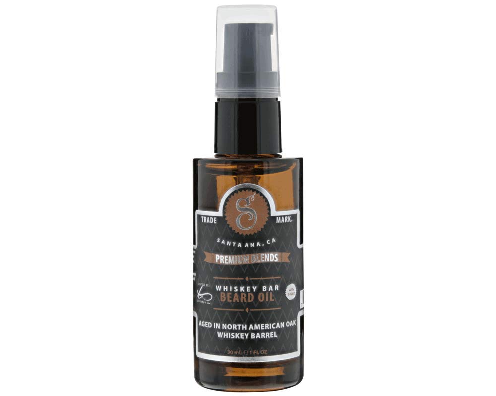 Suavecito Premium Blends Beard Oil whiskey bottle shows woodsy fragrance and hydration benefits.