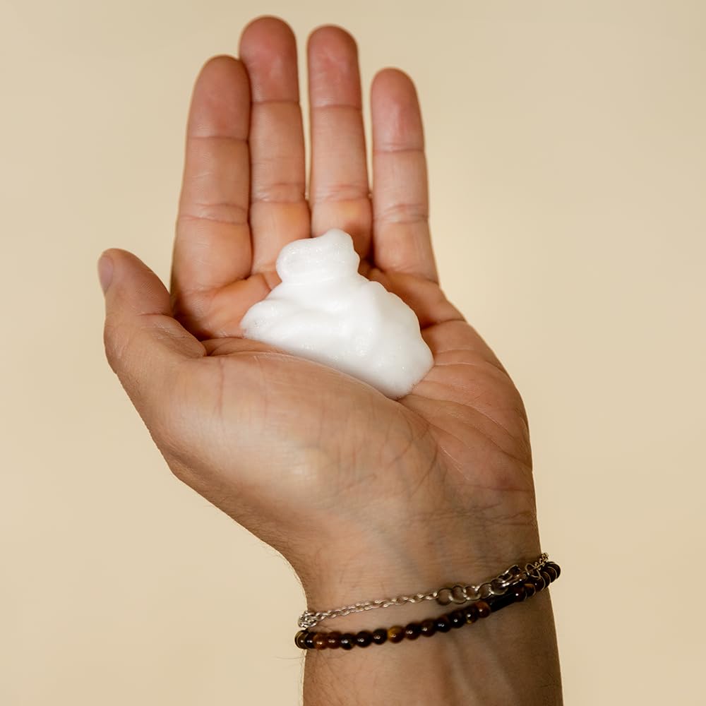 Suavecito Styling Foam Mousse foamy application on damp hair for lift and definition.