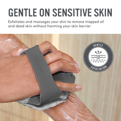 Sud Scrub antimicrobial silicone body scrubber in hand shows non-slip grip.