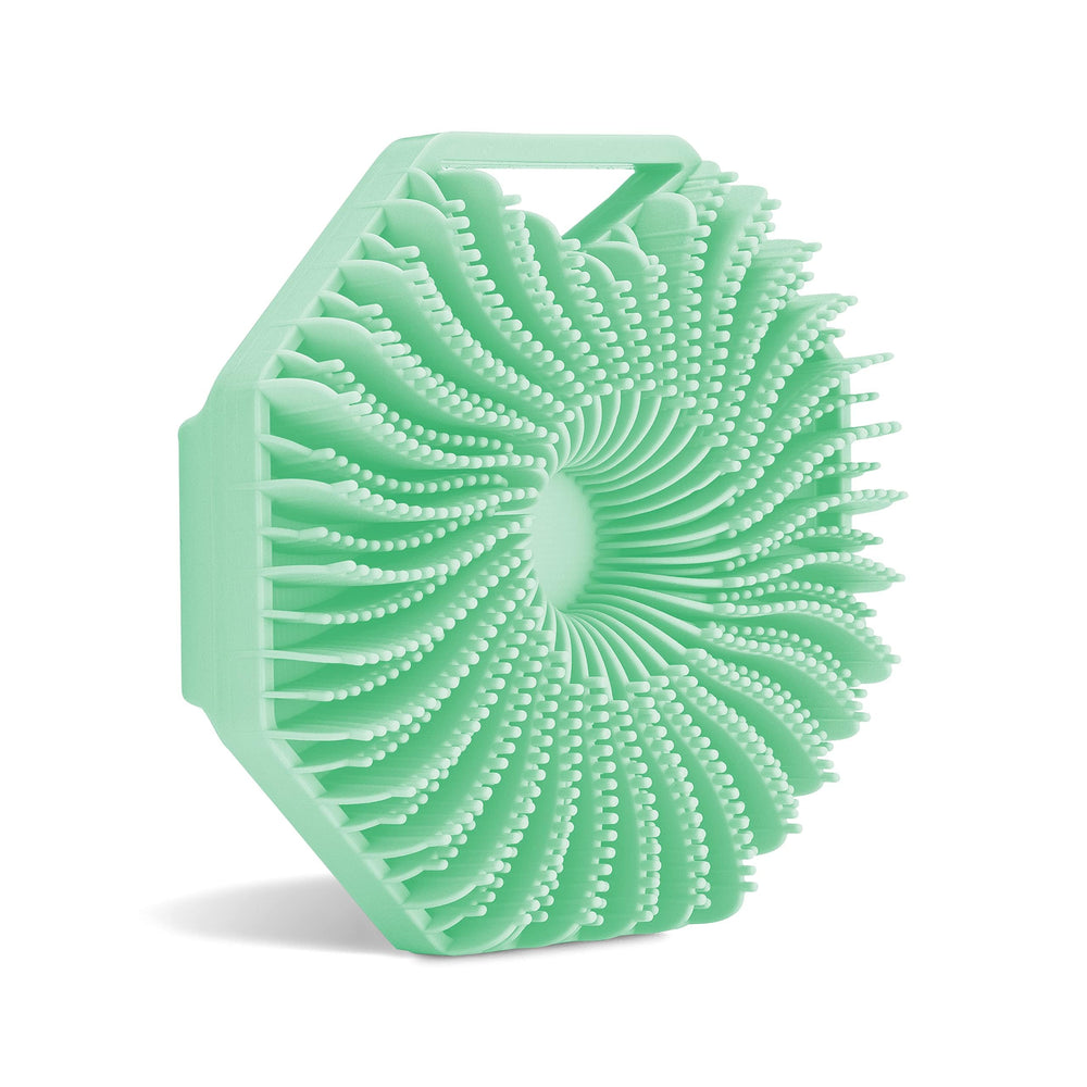 Sud Scrub antimicrobial silicone scrubber mint demonstrates odor-resistant cleansing in the shower