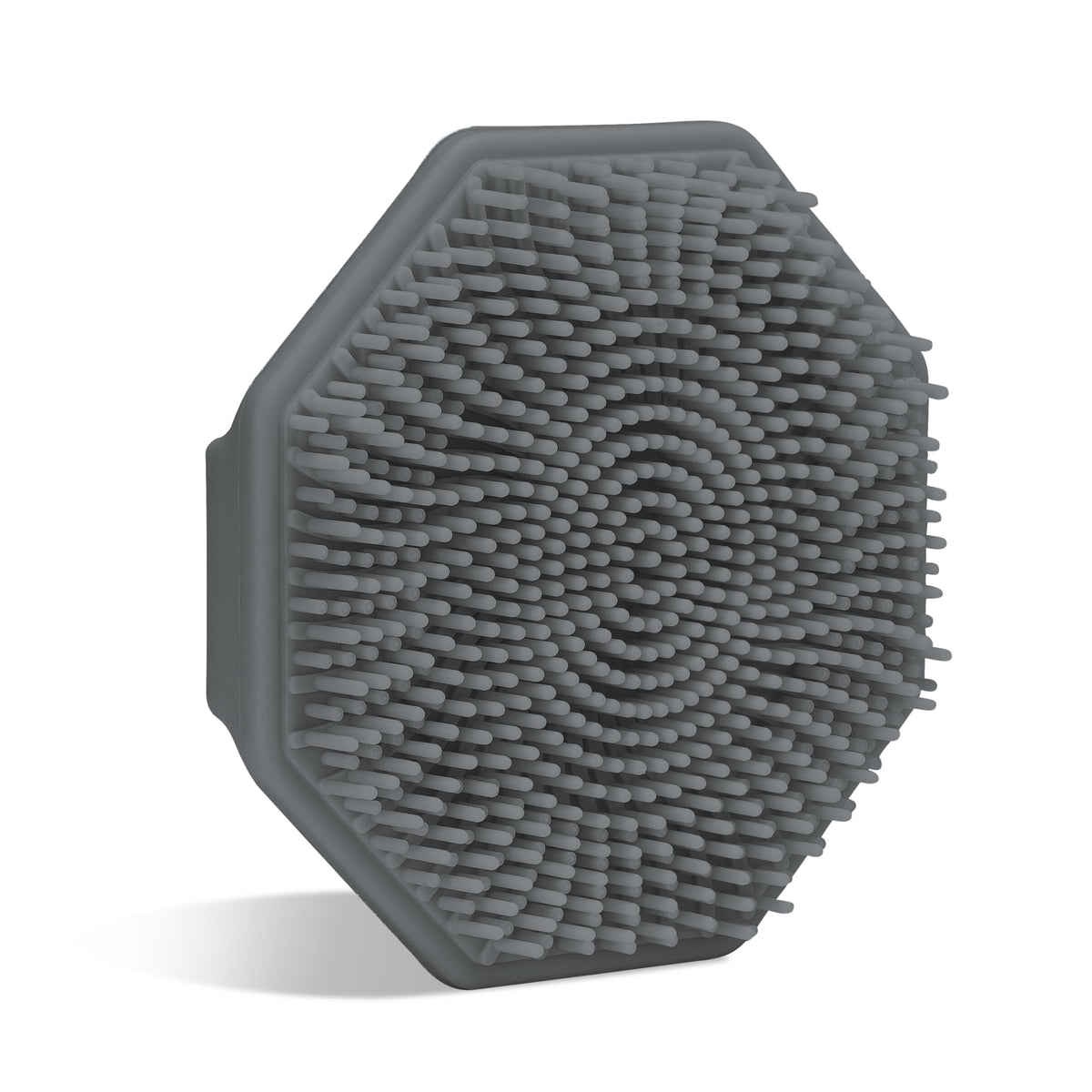 Sud Scrub Charcoal face scrubber demonstrates gentle exfoliation on sensitive skin with silicone design