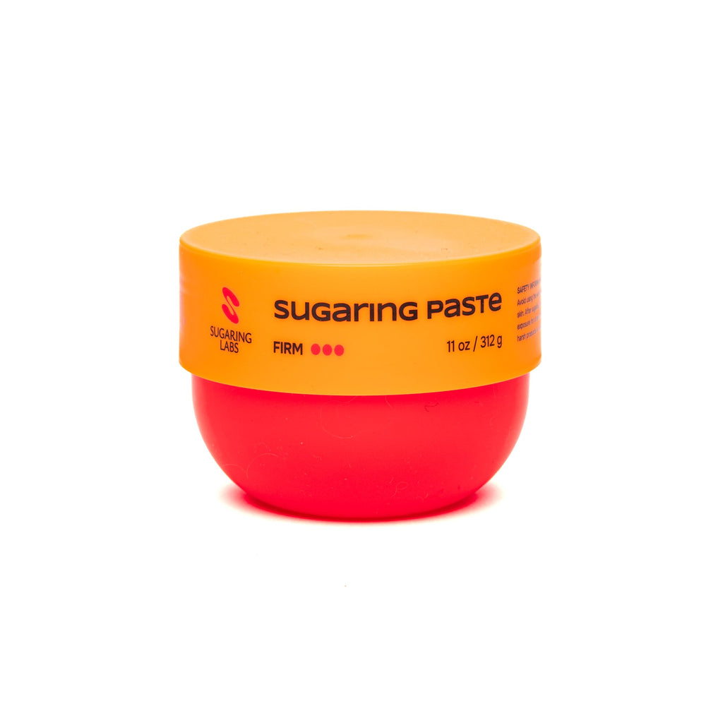 Sugaring Labs Super Firm paste jar close-up shows heat-stable formula for warm climates.