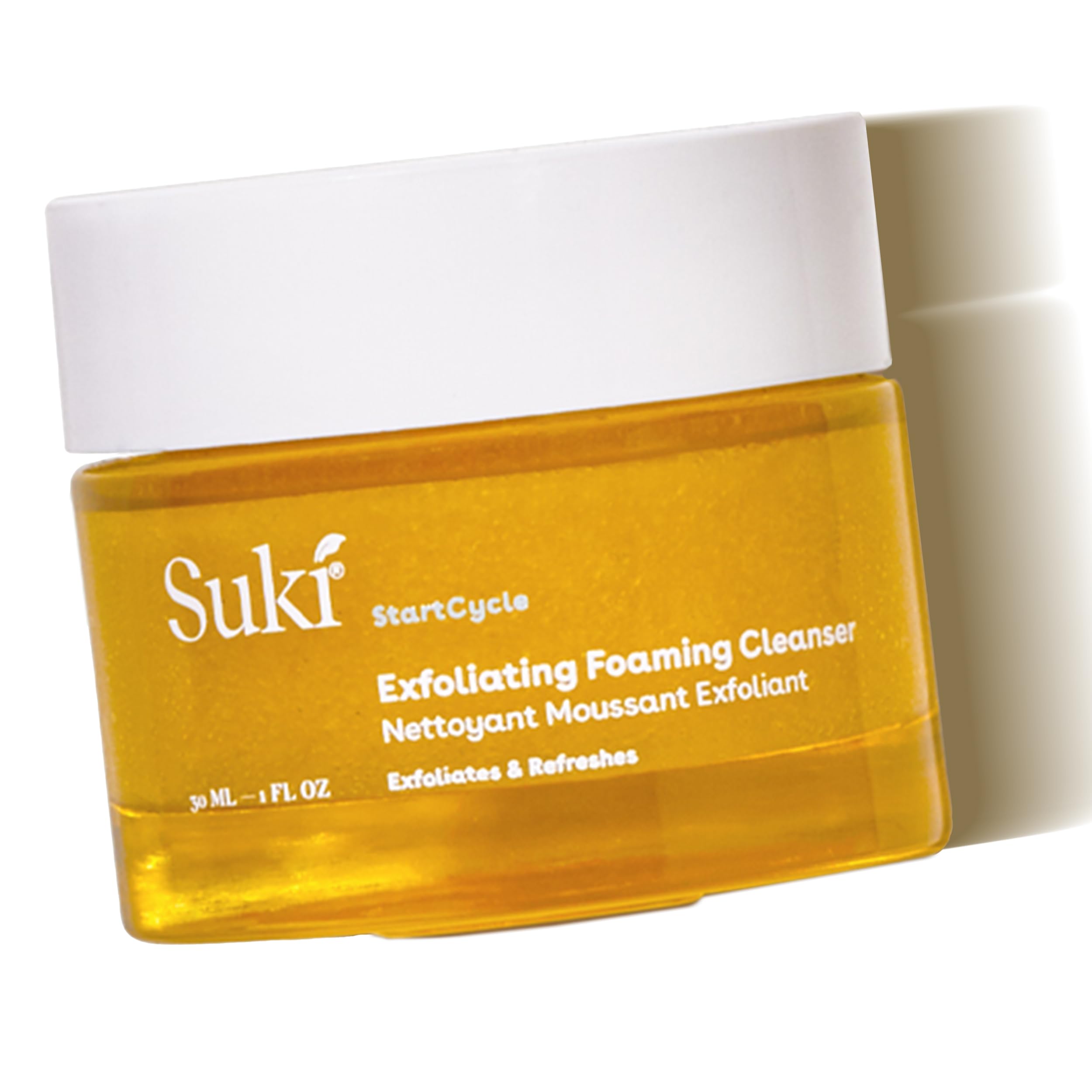 Suki Skincare Exfoliate Foaming Cleanser bottle shows gentle exfoliation for radiant skin