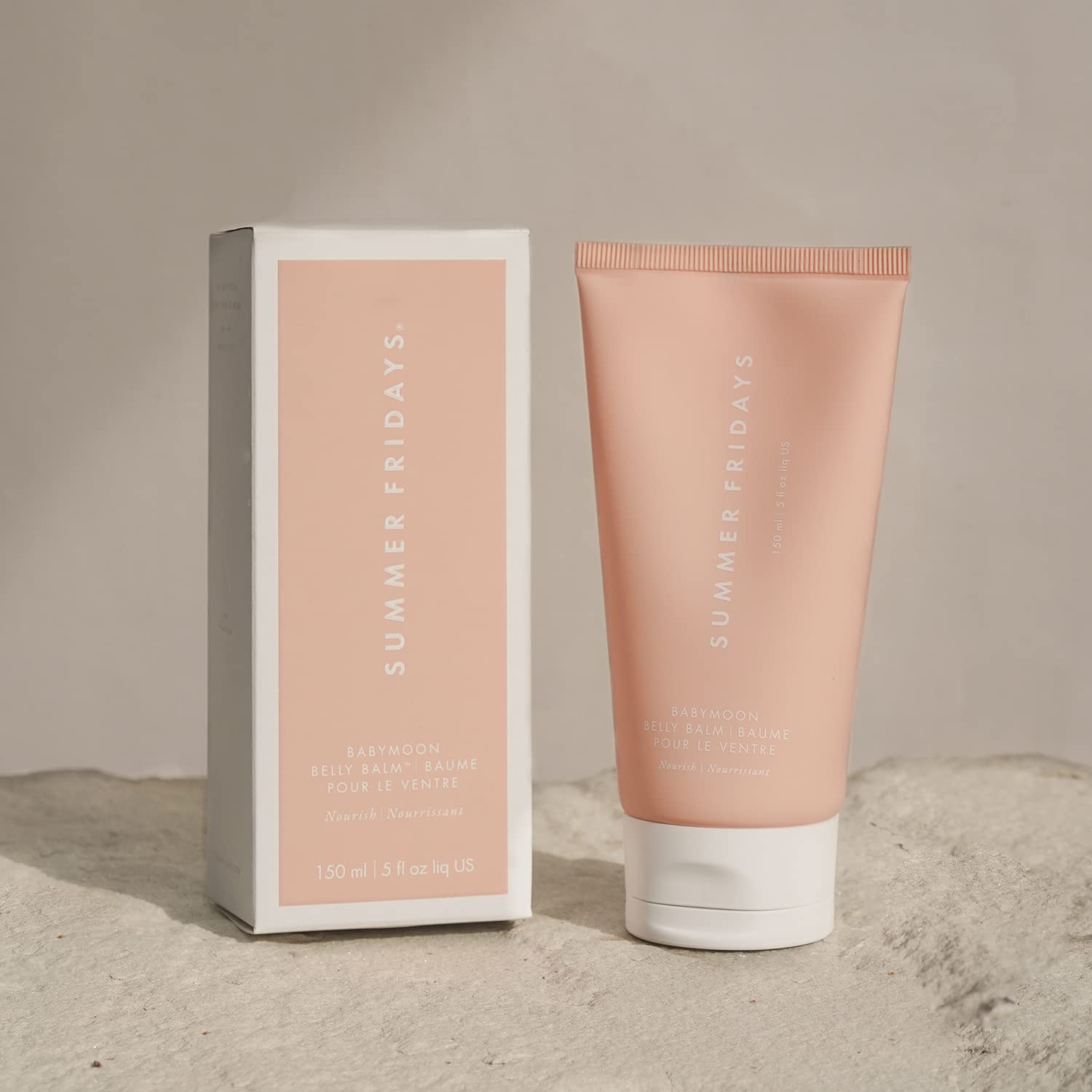 Summer Fridays Babymoon Belly Balm application scene showing gentle massage.