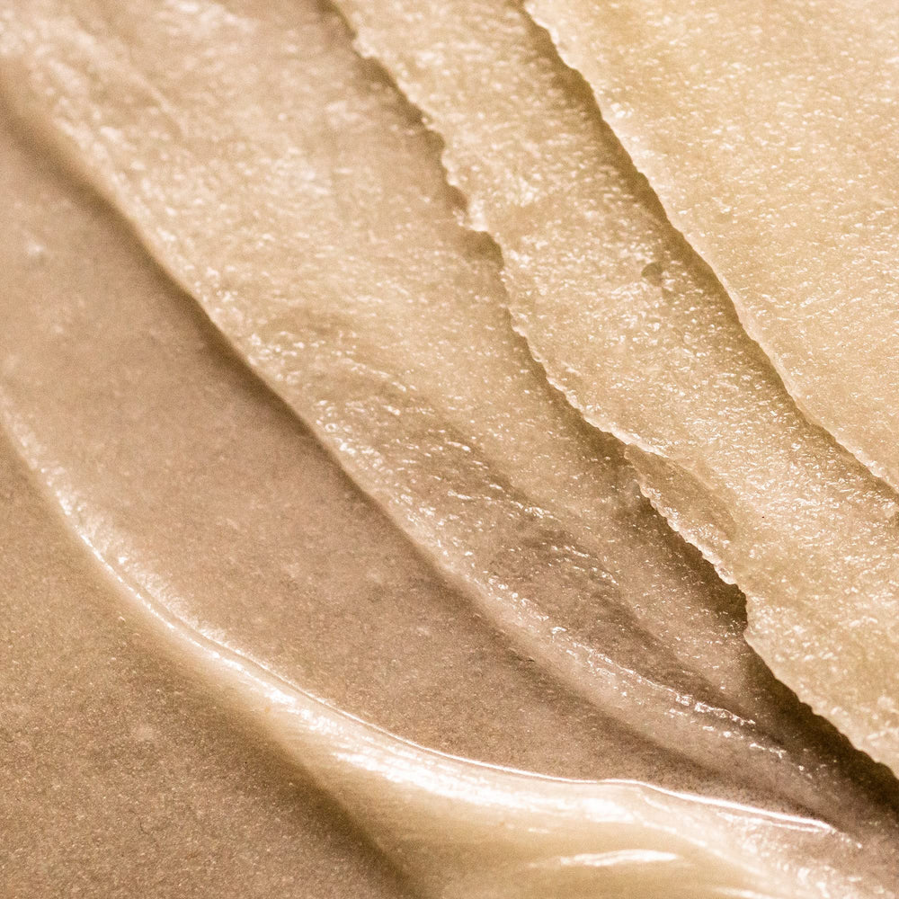 Summer Fridays Babymoon Belly Balm texture swatch on skin demonstrates rich moisture.