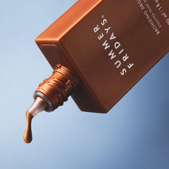 Swirl-on application of Summer Fridays Bronzing Drops creates a natural sun-kissed radiance