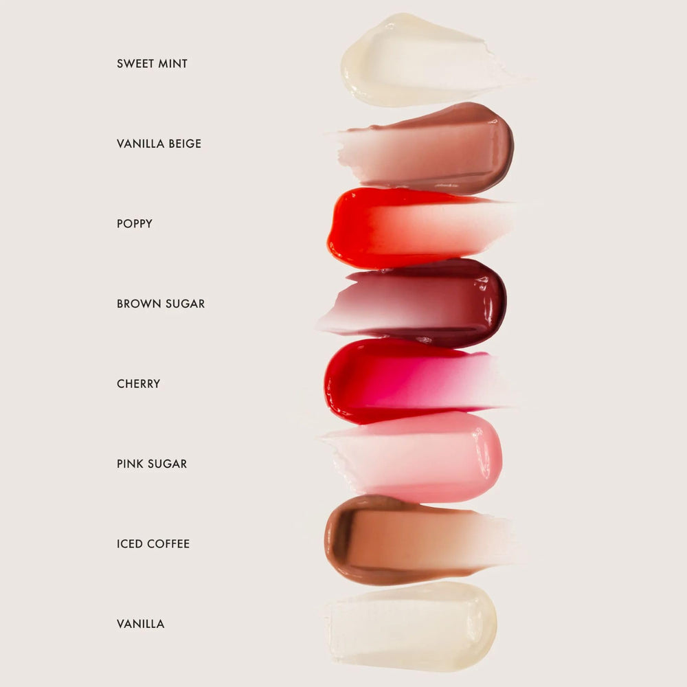 Summer Fridays consumer-use scenarios applying lip balm under lipstick.