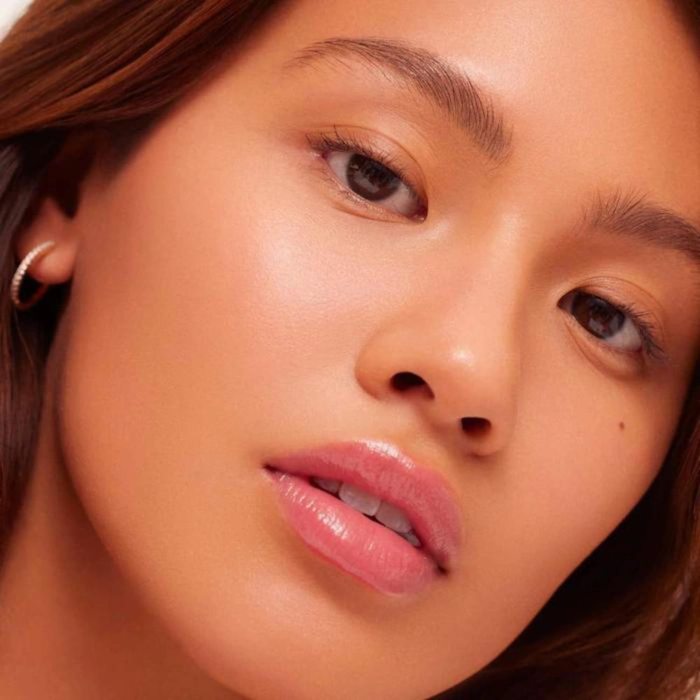 Summer Fridays dream lip oil packaging emphasizing vegan, cruelty-free claim.