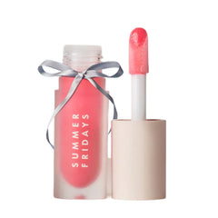 Summer Fridays Dream Lip Oil Pink Cloud tube closeup shows glossy nourishment for lips