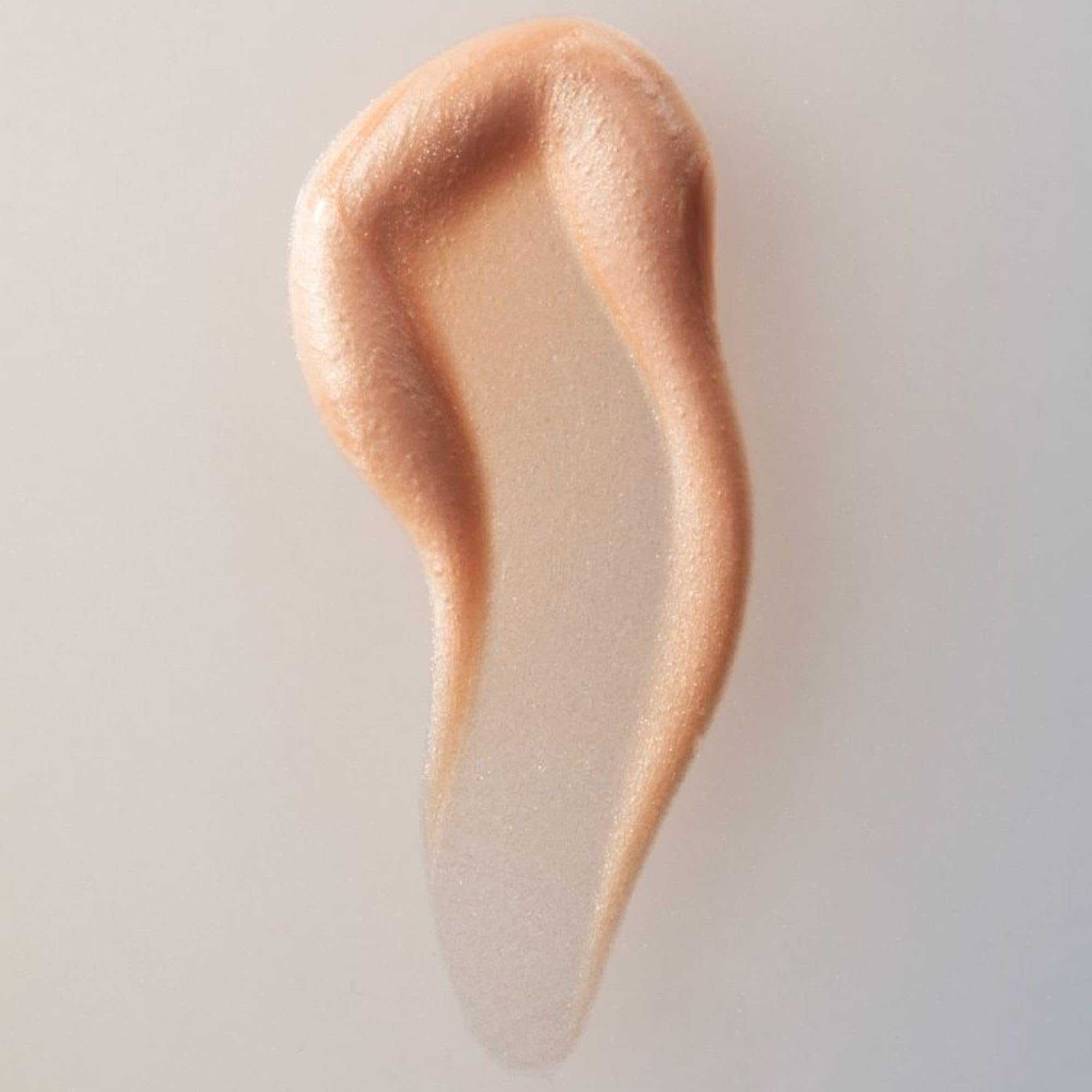 Summer Fridays Illuminating Drops glow on cheeks for a dewy, glass-skin look.