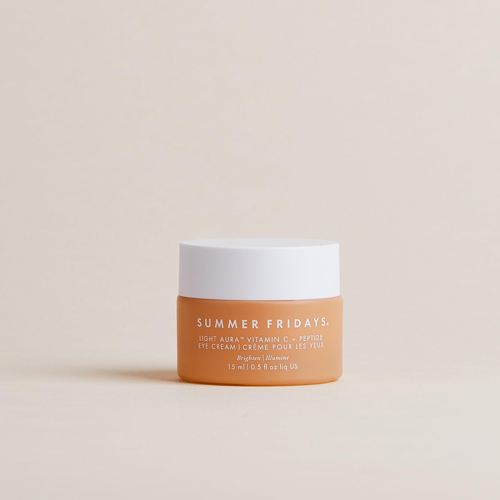 Summer Fridays Light Aura Eye Cream being gently dabbed around the eye contour