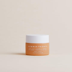 Summer Fridays Light Aura Eye Cream being gently dabbed around the eye contour