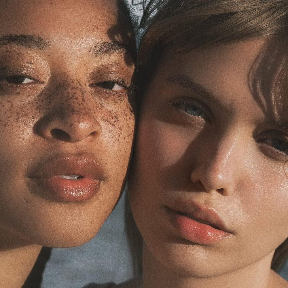 SPF 30 swatch on skin illustrates broad spectrum protection suitable under makeup.