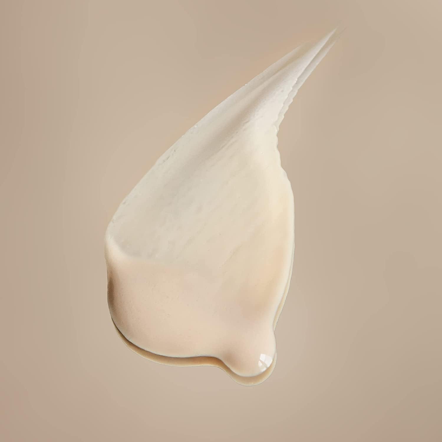 Swirl-on-skin image shows satin-like texture and subtle glow after application.