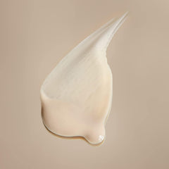 Swirl-on-skin image shows satin-like texture and subtle glow after application.