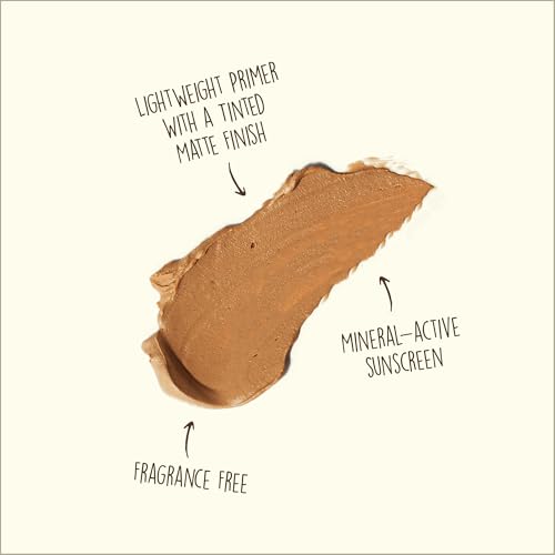 Sun Bum SPF30 tinted sunscreen being applied as a light makeup base