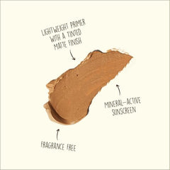 Sun Bum SPF30 tinted sunscreen being applied as a light makeup base