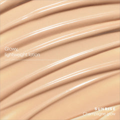 Applying Glowscreen Sunrise as a makeup primer for a dewy base