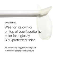 Supergoop Lipscreen Shine SPF 40 bottle cap detail emphasizing compact, travel-friendly packaging.