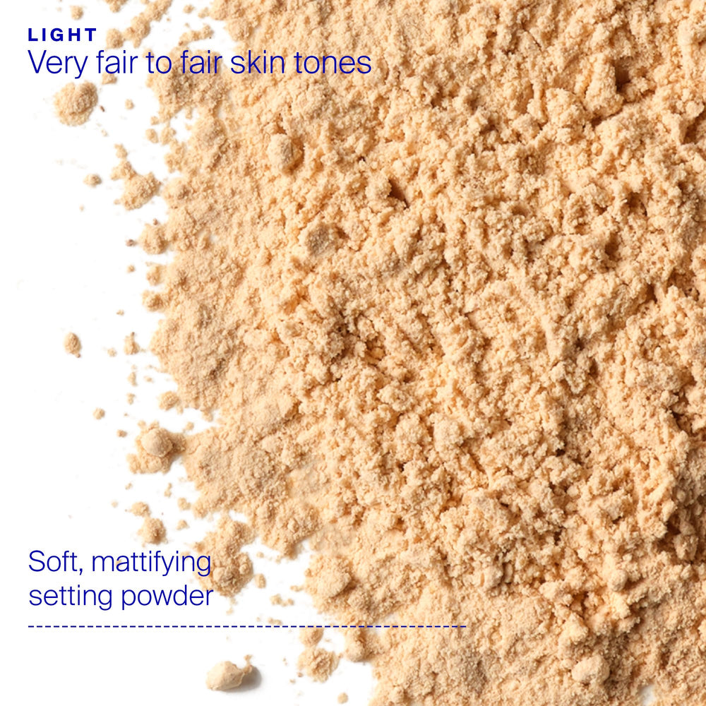 Supergoop! Re(setting) Mineral Powder Light twist-lock brush enables mess-free touch-ups.