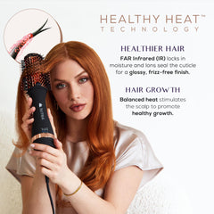 SUTRA IR Infrared 2in Blowout Brush in action delivering volumized, smooth results during styling.