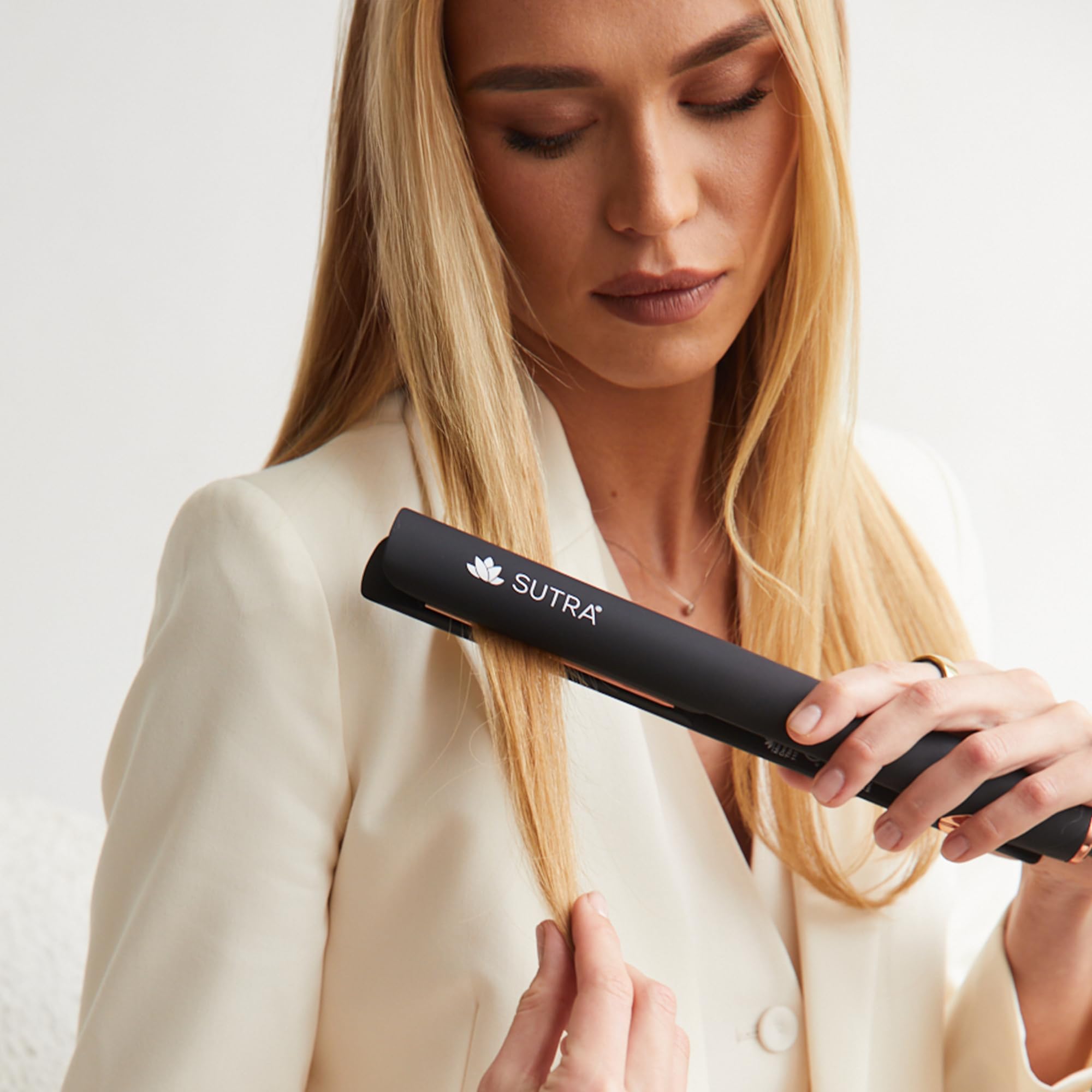 Sutra IR2 flat iron glossy, frizz-free finish with lasting shine.