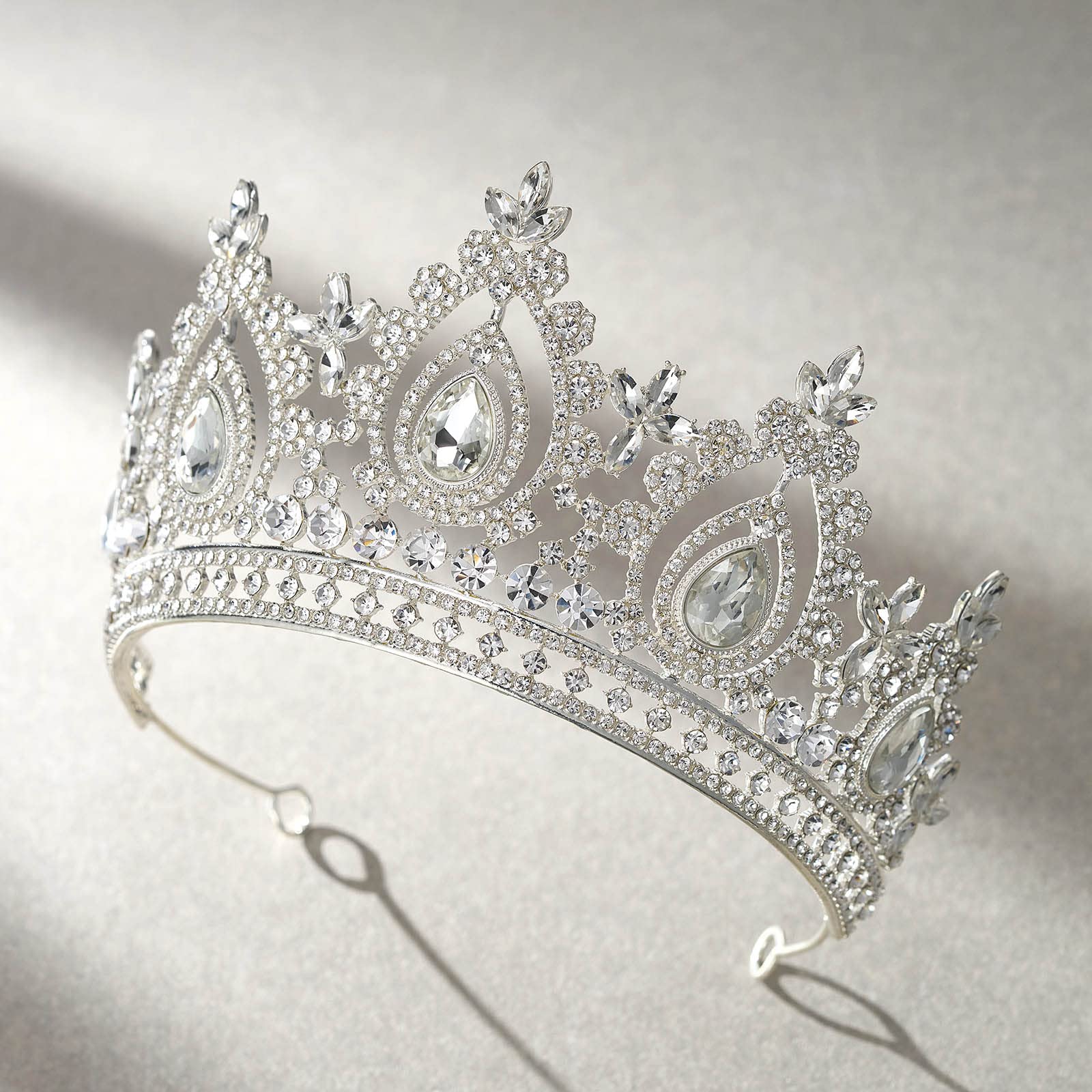 SWEETV quinceañera and birthday headpiece adds sparkling drama.