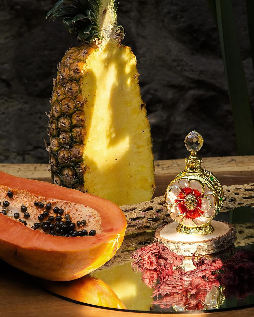 Layali Rouge bottle emphasizes top notes of mango and lemon for a bright opening.