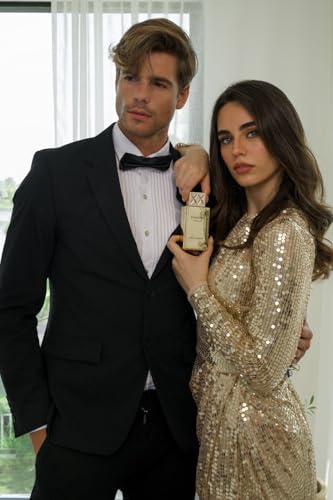 Gold-wrapped packaging of Shaghaf Oud Elixir suggests luxury unboxing and gift appeal.