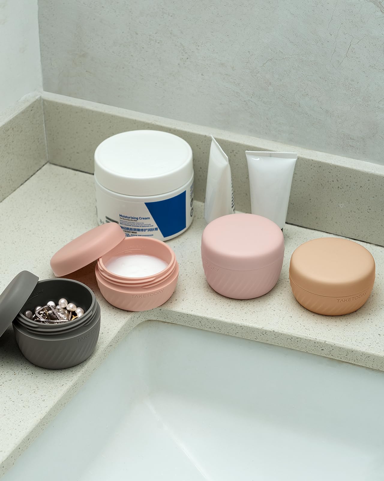 TakeToday compact travel essentials apricot set in a carry-on bag for easy organization.