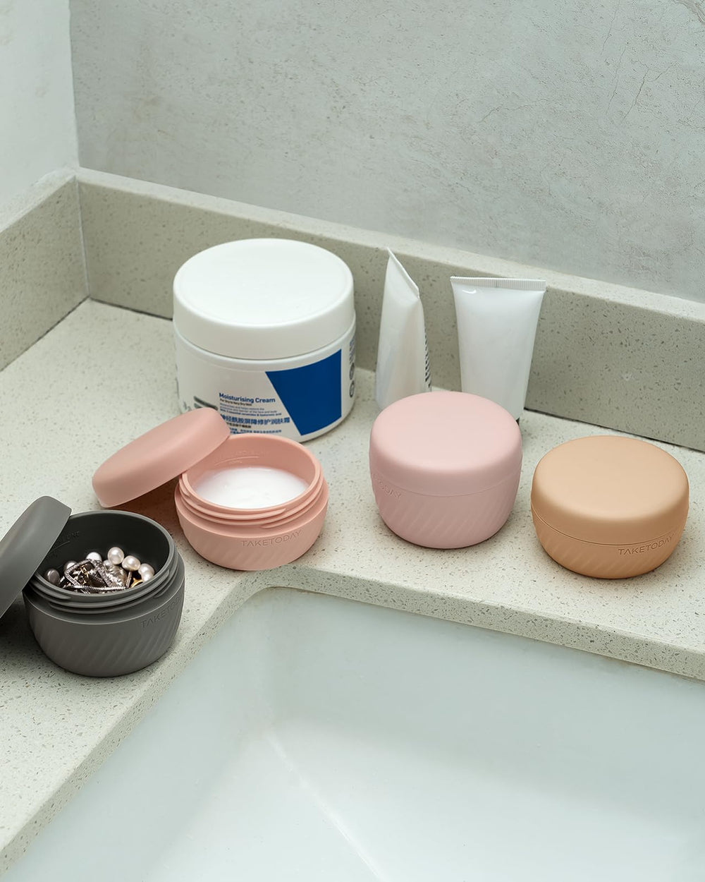 TakeToday compact travel essentials apricot set in a carry-on bag for easy organization.