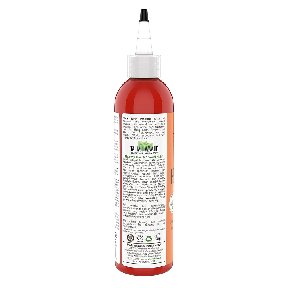 Taliah Waajid African Healing Oyl bottle dispensed for scalp care.