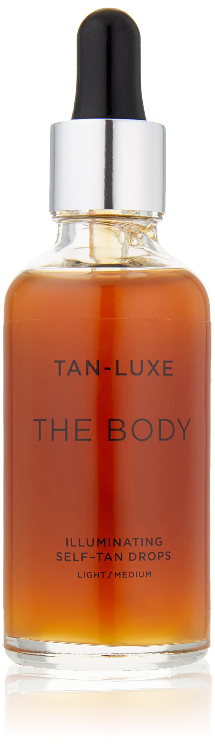 Tan-Luxe The Body bottle closeup shows vegan formula for a customizable glow.