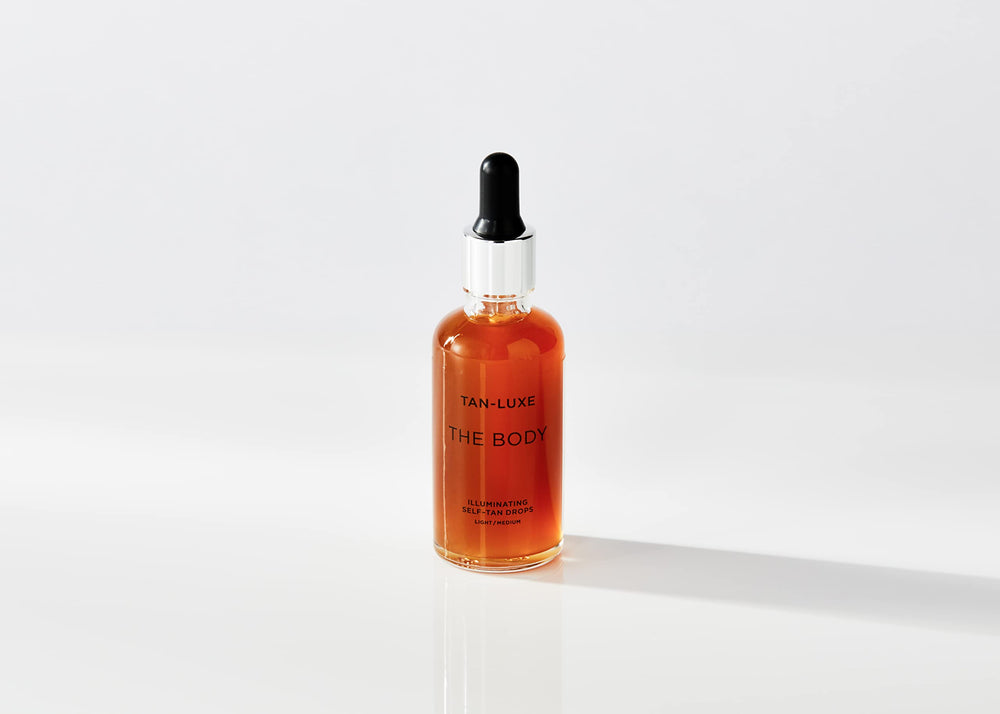 Tan-Luxe Body Illuminating Drops dropper highlights easy, precise self-tanning control.