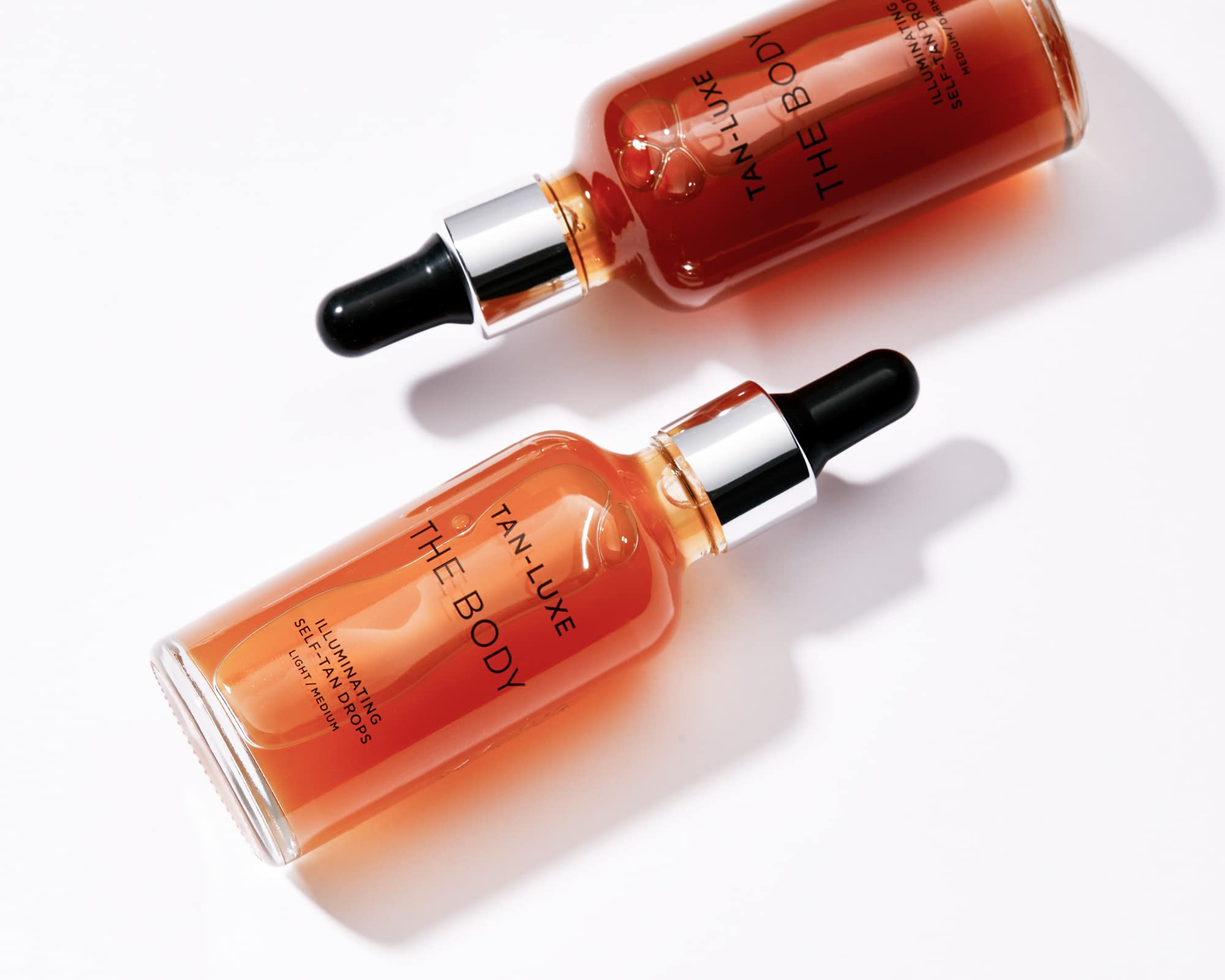 Tan-Luxe Body Illuminating Drops on lotion mix for a streak-free glow.