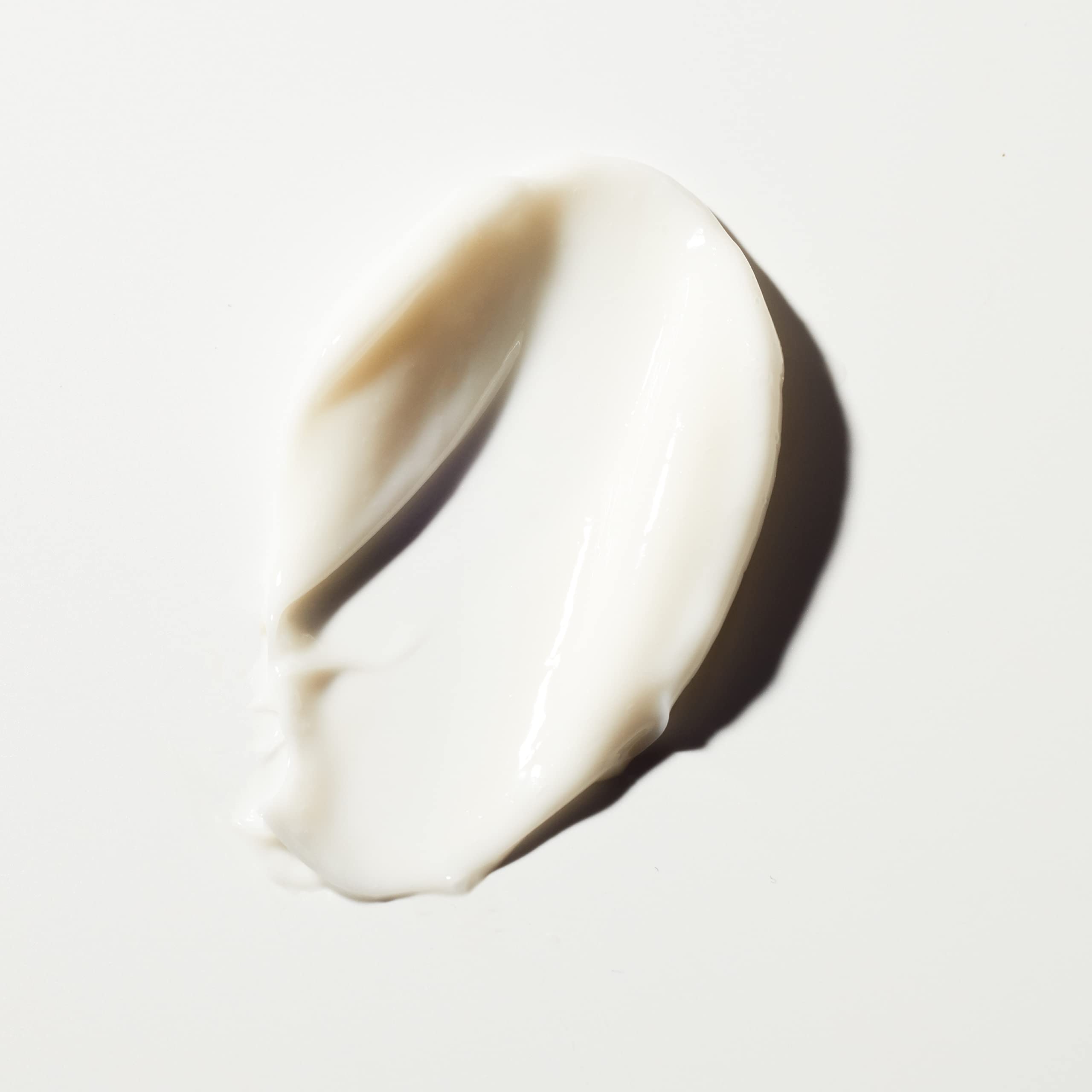 Tan-Luxe The Crème applied to face neck and décolleté in upward strokes.