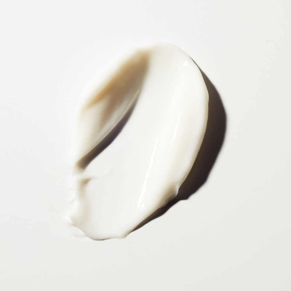 Tan-Luxe The Crème applied to face neck and décolleté in upward strokes.