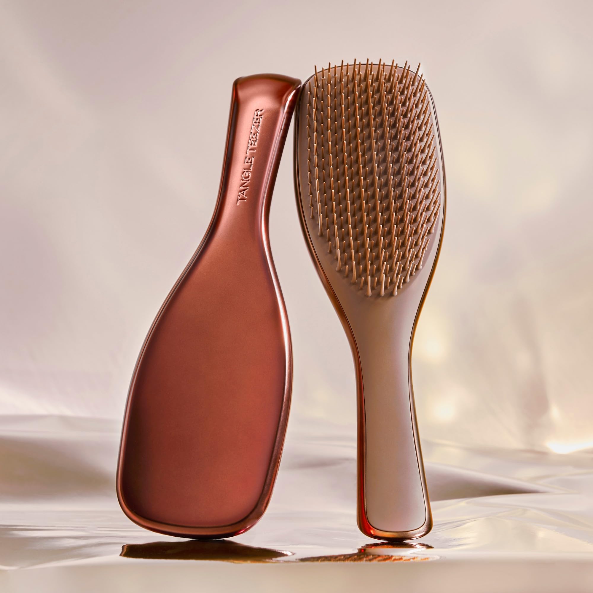 Tangle Teezer Chrome Ultimate Detangler Brush used on wet hair for knot-free glide