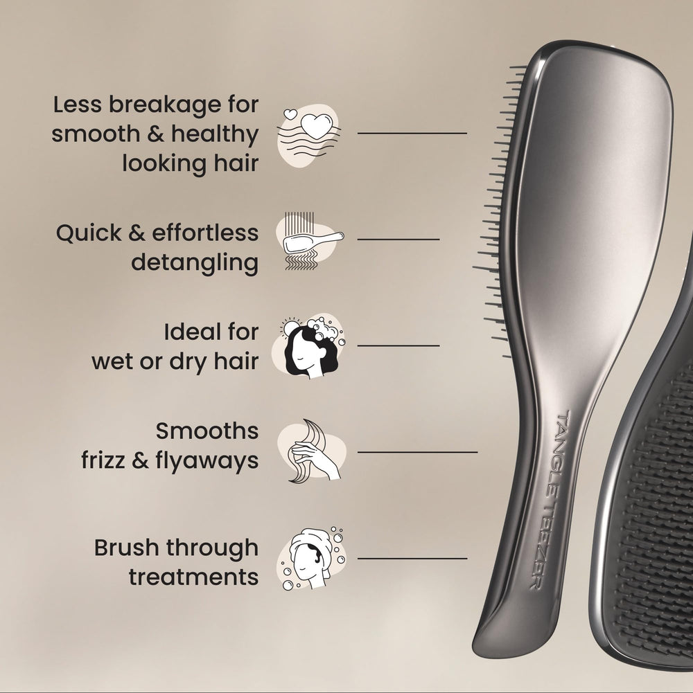 Tangle Teezer Chrome Ultimate Detangler smoothing curly hair with minimal tugging